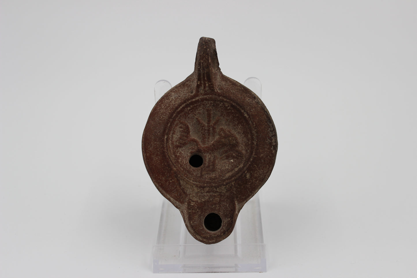 Mid-Imperial Mould-Made Oil Lamp with Dolphin Motif