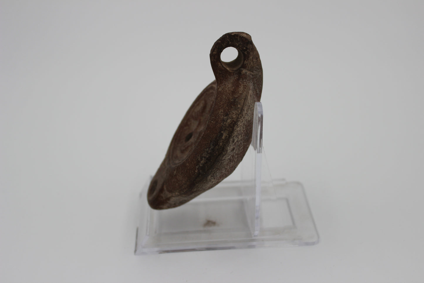 Mid-Imperial Mould-Made Oil Lamp with Dolphin Motif