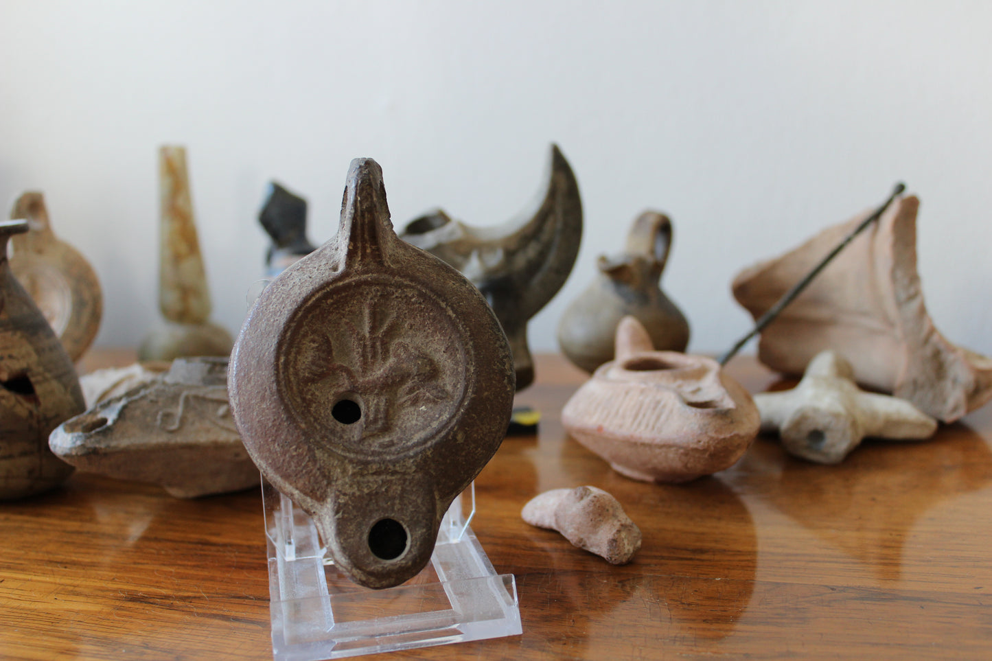 Mid-Imperial Mould-Made Oil Lamp with Dolphin Motif