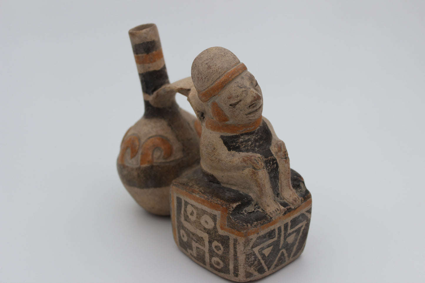 Peruvian Double-Chambered Vase with Seated Male Figure